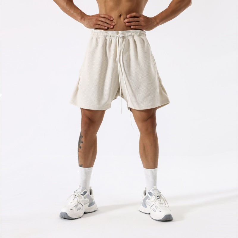 Pantalones cortos de entrenamiento transpirables de moda para hombres