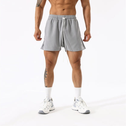 Pantalones cortos de entrenamiento transpirables de moda para hombres