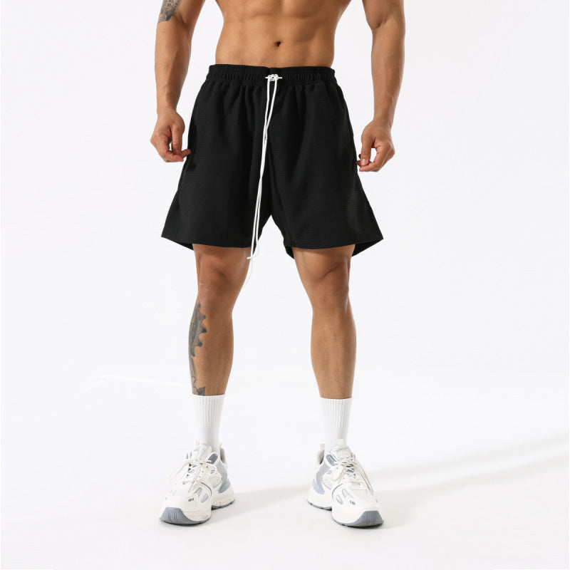 Pantalones cortos de entrenamiento transpirables de moda para hombres